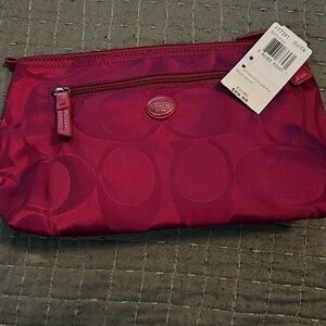Brand new women’s fuchsia colored coach bag